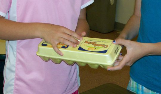 SWMD Bonnie Classroom Pics 008, 2 kids holding a closed egg crate